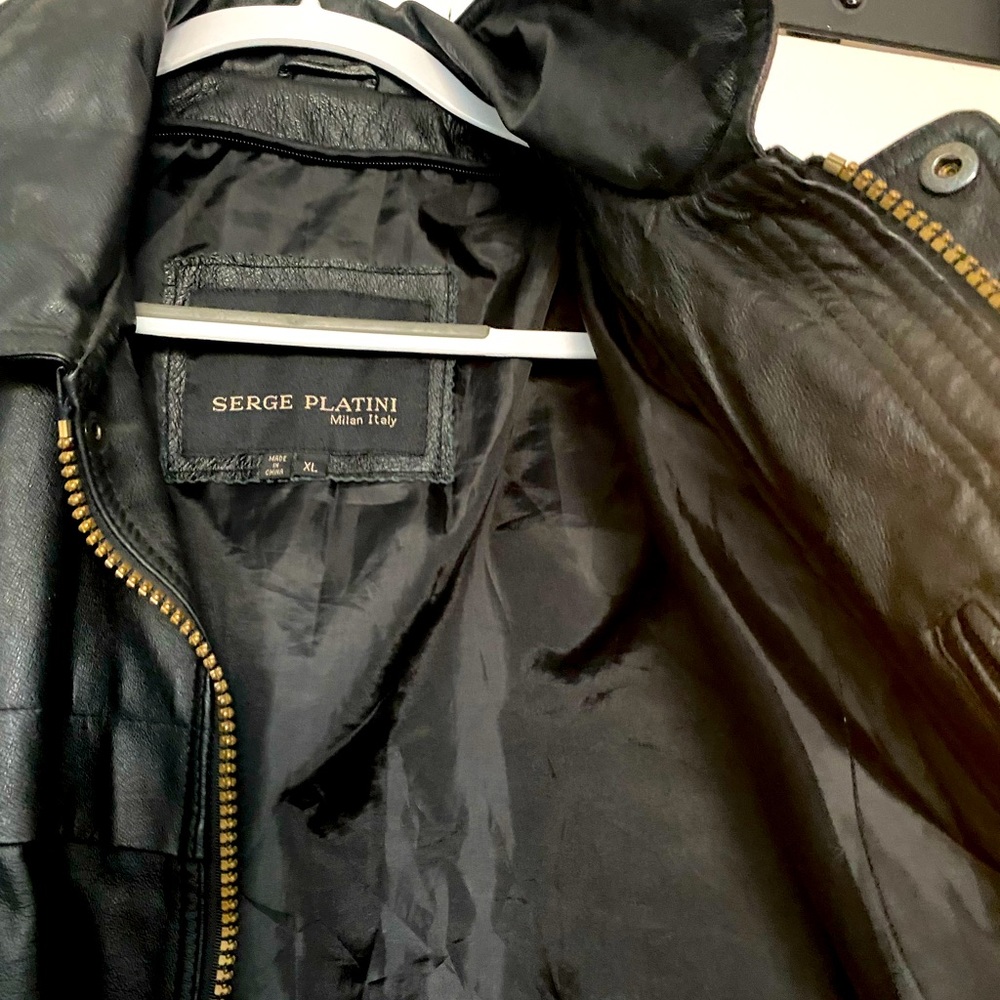 The jacket was a gift, but doesn’t fit. It should be worn by someone with style!